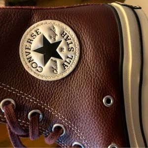 Brand new. Leather converse